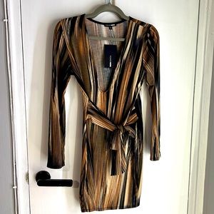 Deep plunge black and brown bodycon dress.